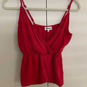 About Us Revolve pink tank top